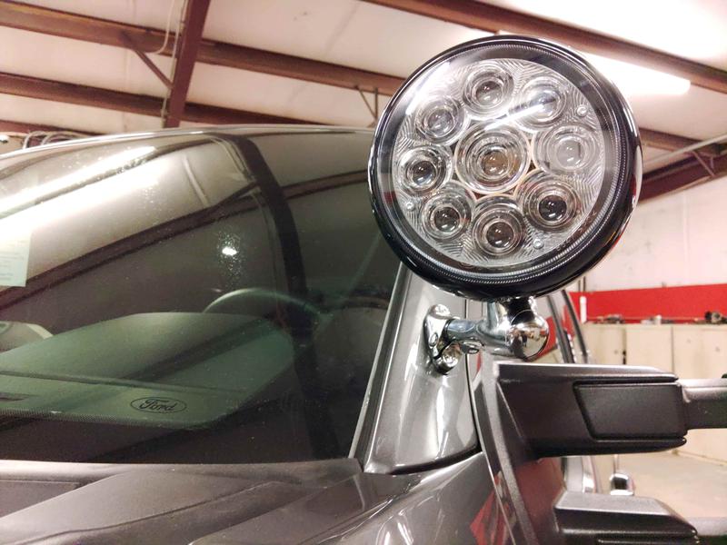 Vehicle-mounted spotlight installed near the driver's A-pillar